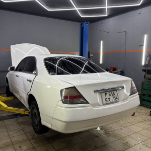 Ремонт стоек Nissan Cedric 2001 цвет белый